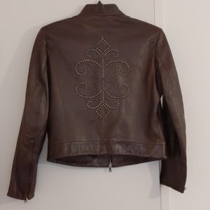 Leather jacket with exquisite studded back